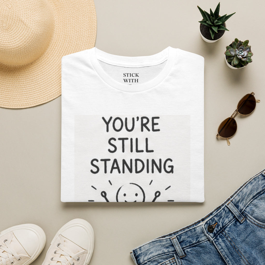 You’re Still Standing T-Shirt — Encouraging Stick Figure Tee for Resilience & Recovery
